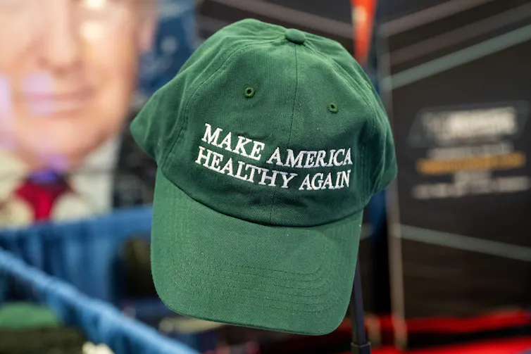 A green cap with Make America Healthy Again stitched in white lettering.