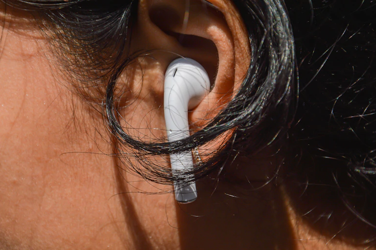 Close up of an earbud in an ear.