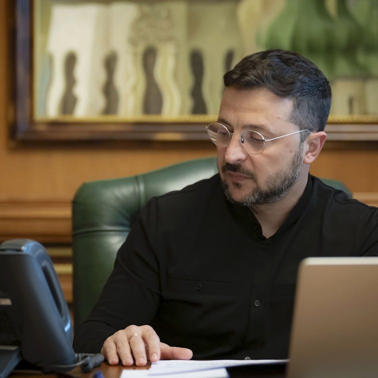 Zelensky speaking to Trump on the phone.