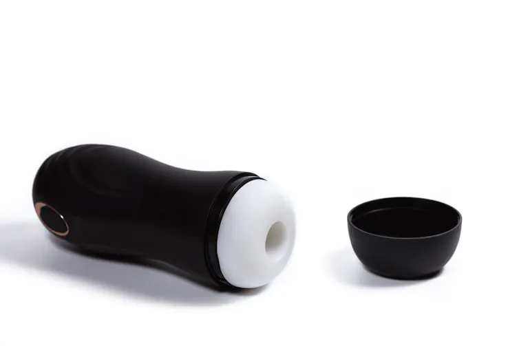 a male sex toy with a hole on one end
