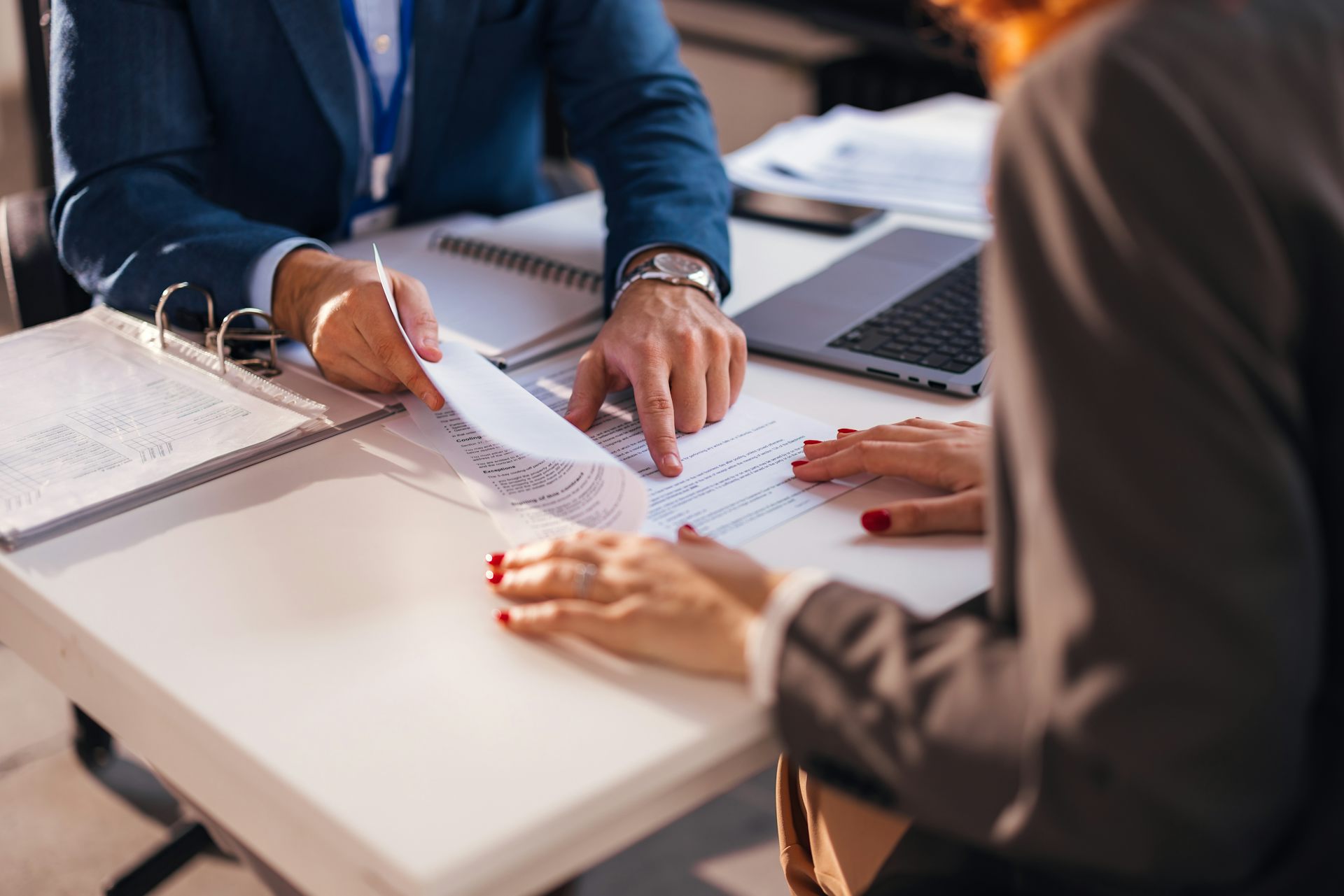 Client and lender meeting at a table