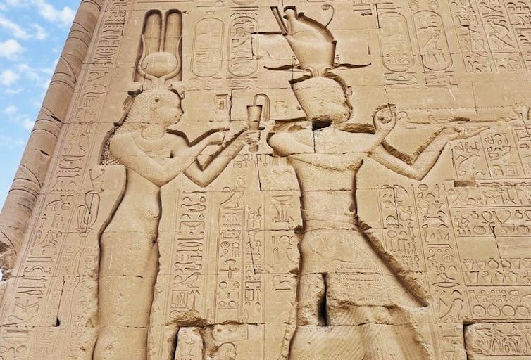Cleopatra, Mythical Queen 2 Cleopatra and Cesarion. Exterior wall of Denderah temple, Egypt