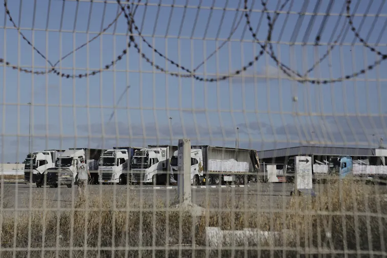 Trucks shown at a border crossing.