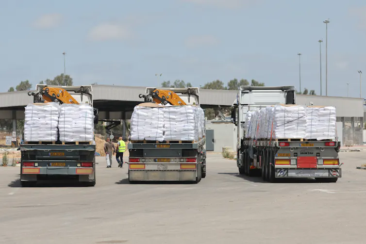 Three aid trucks near the Gaza border.