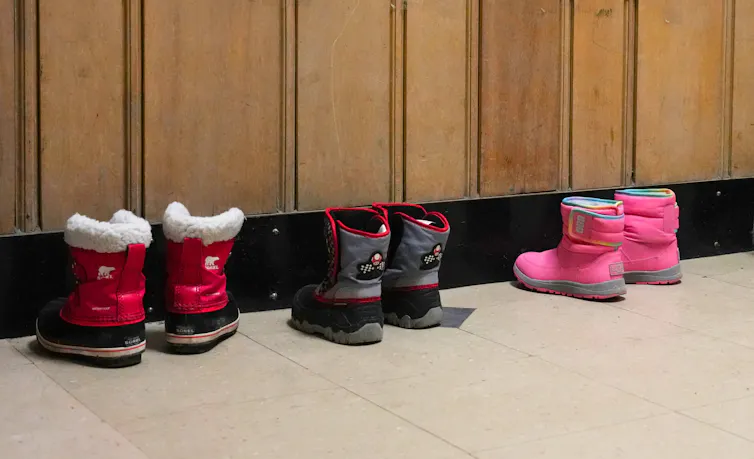 A row of children's boots.