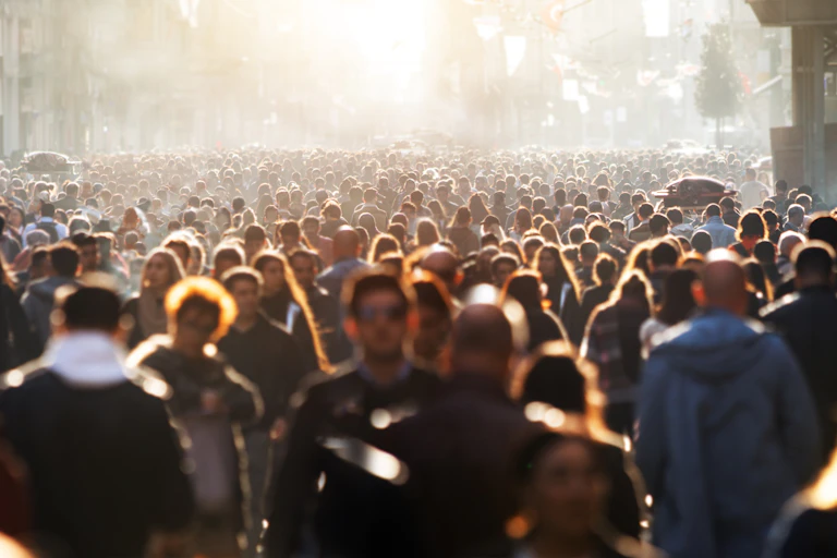 blurred shot of a large crowd of people