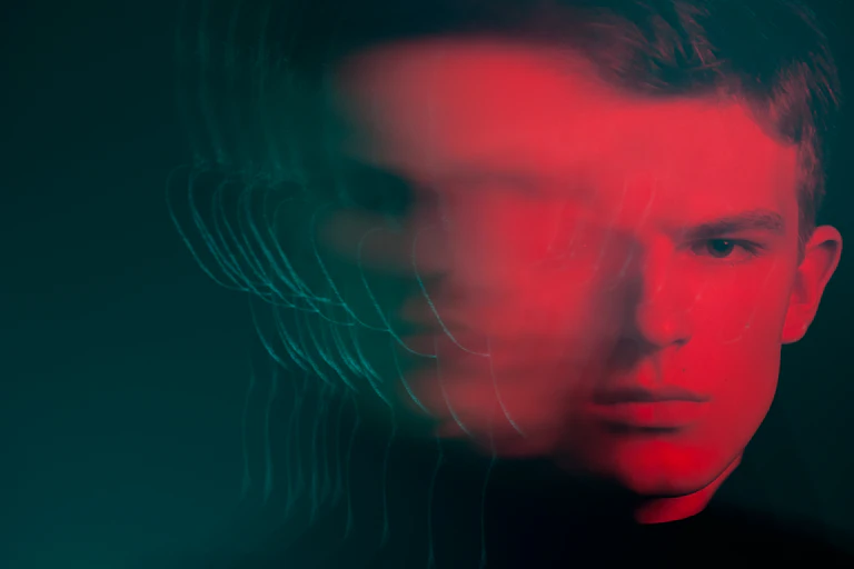 Portrait of a man's face with blurred effect.