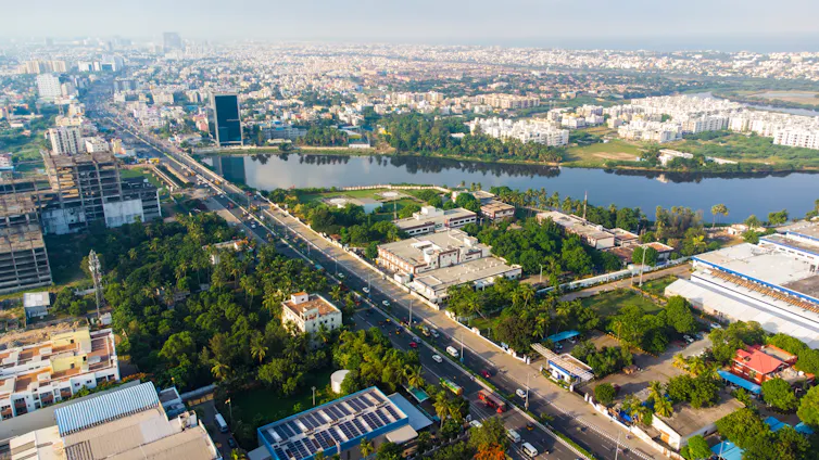 A river snaking through the city of Chennai.