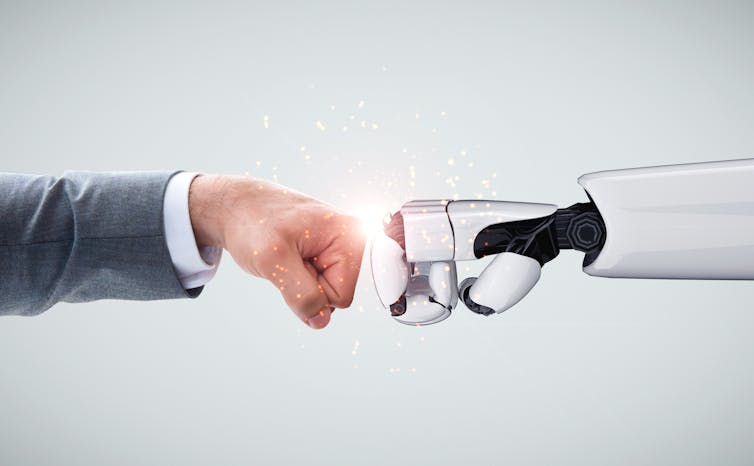 Generated image of a human hand and robot hand fist bumping