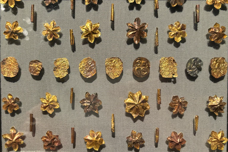 Some gold discs from a reliquary said to be that of the historical Buddha.