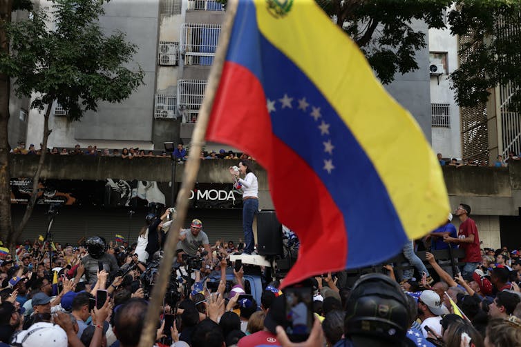 Maduro consolidates grasp on energy as Venezuela’s opposition boycotts elections 1 Opposition supporters during a rally in Caracas, Venezuela.