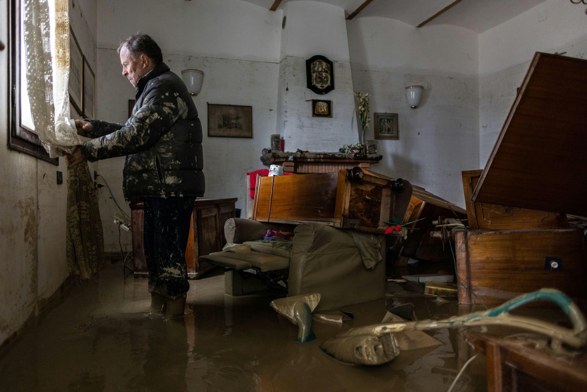 Photo of man in a flooded room