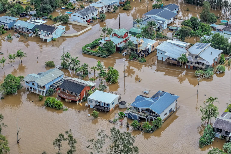 Flooding is seen around houses in Port Macquarie, New South Wales