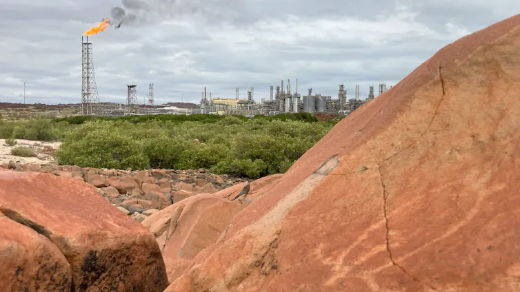 The North West Shelf gas project is seen with a petroglyph of a turtle.