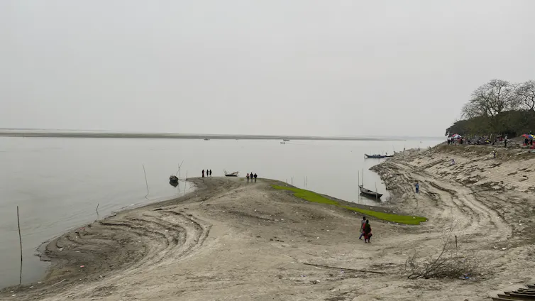 A dry river bank.