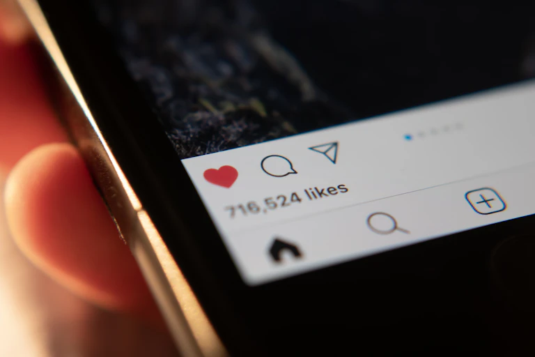 Close up of the bottom of an Instagram post showing the post has over 716,000 likes