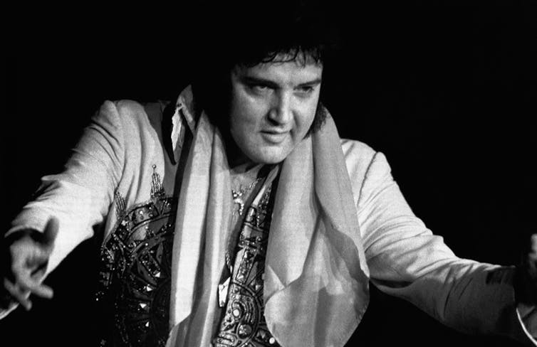 A black and white picture of Elvis from the mid -70s.