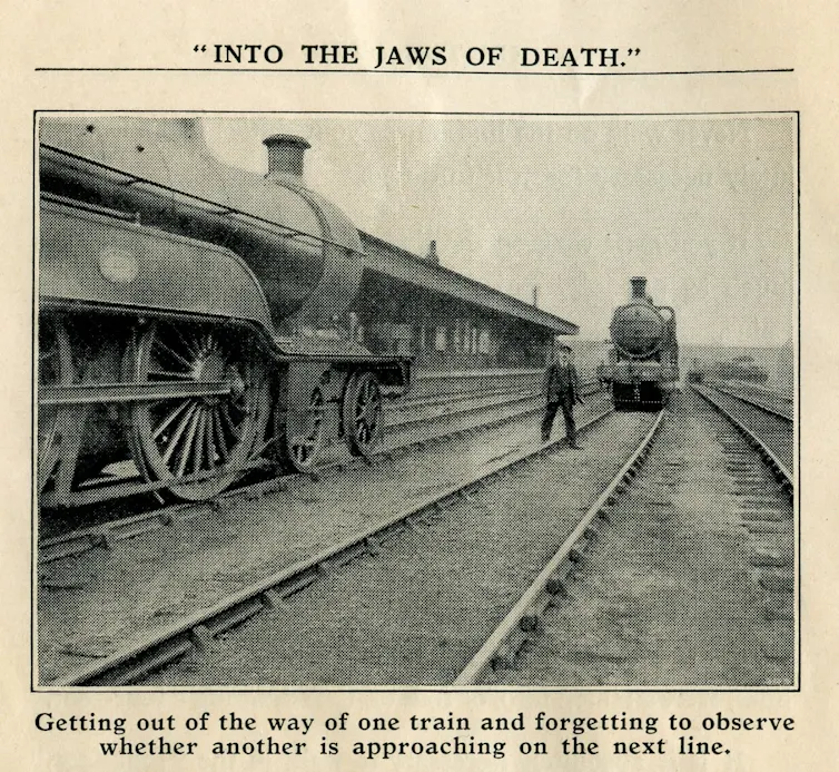 photo from a vintage safety campaign showing a railway worker stepping into the path of an oncoming train.