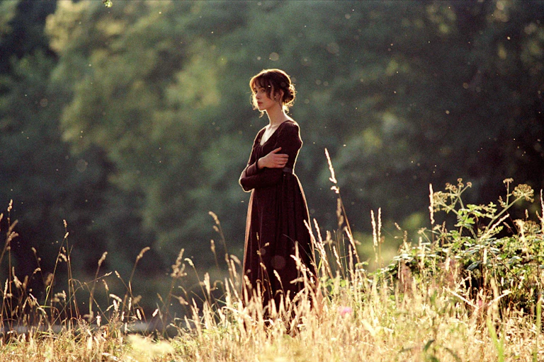 Keira Knightley stood in a field