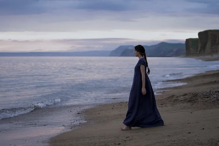 Dakota Johnson on a beach