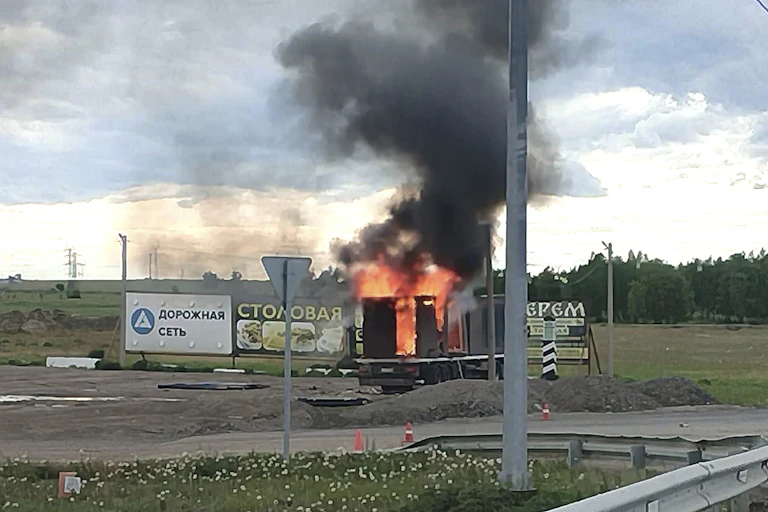 A truck in flames.