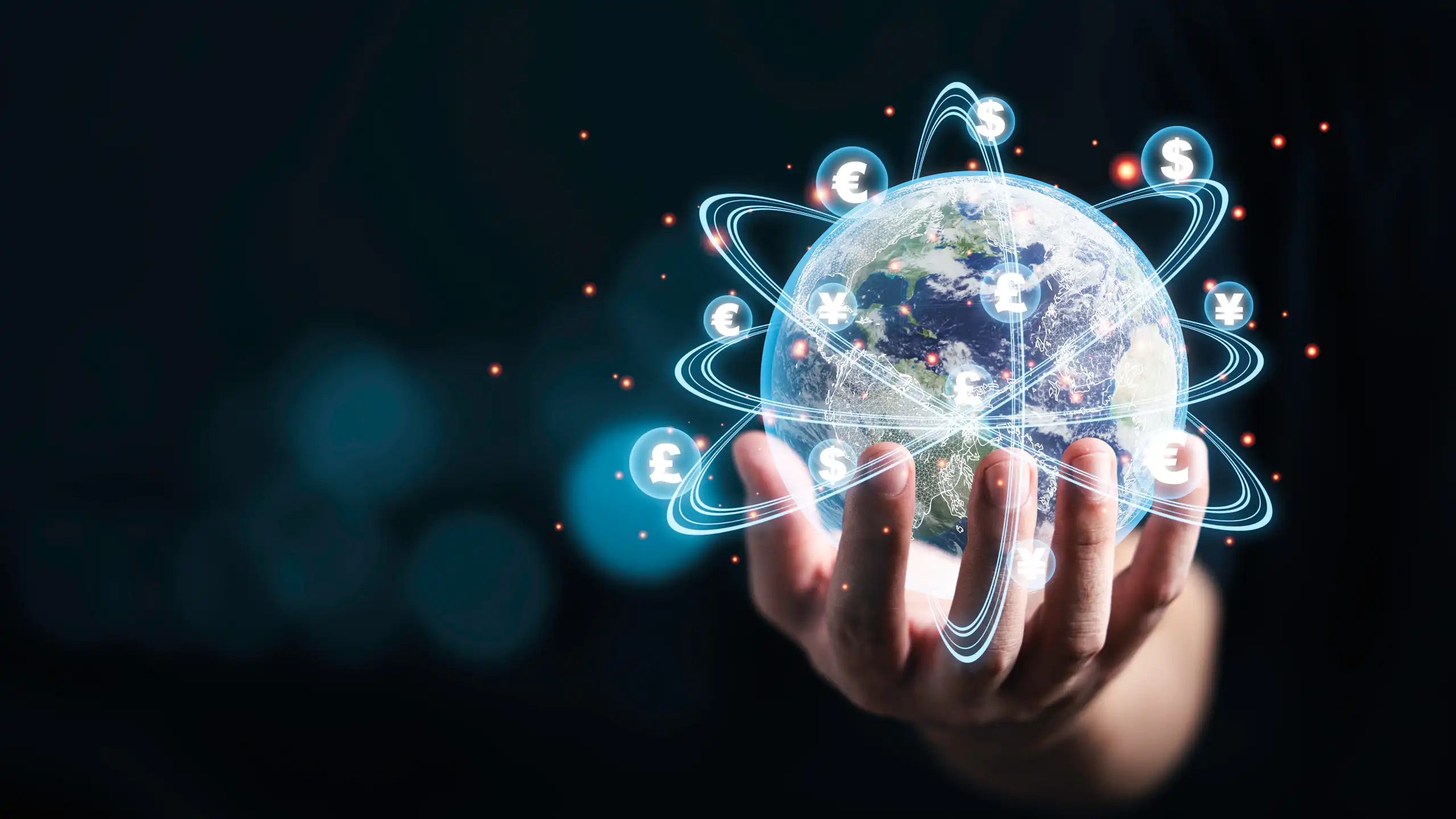 Illustration of a hand holding a globe with multiple currencies