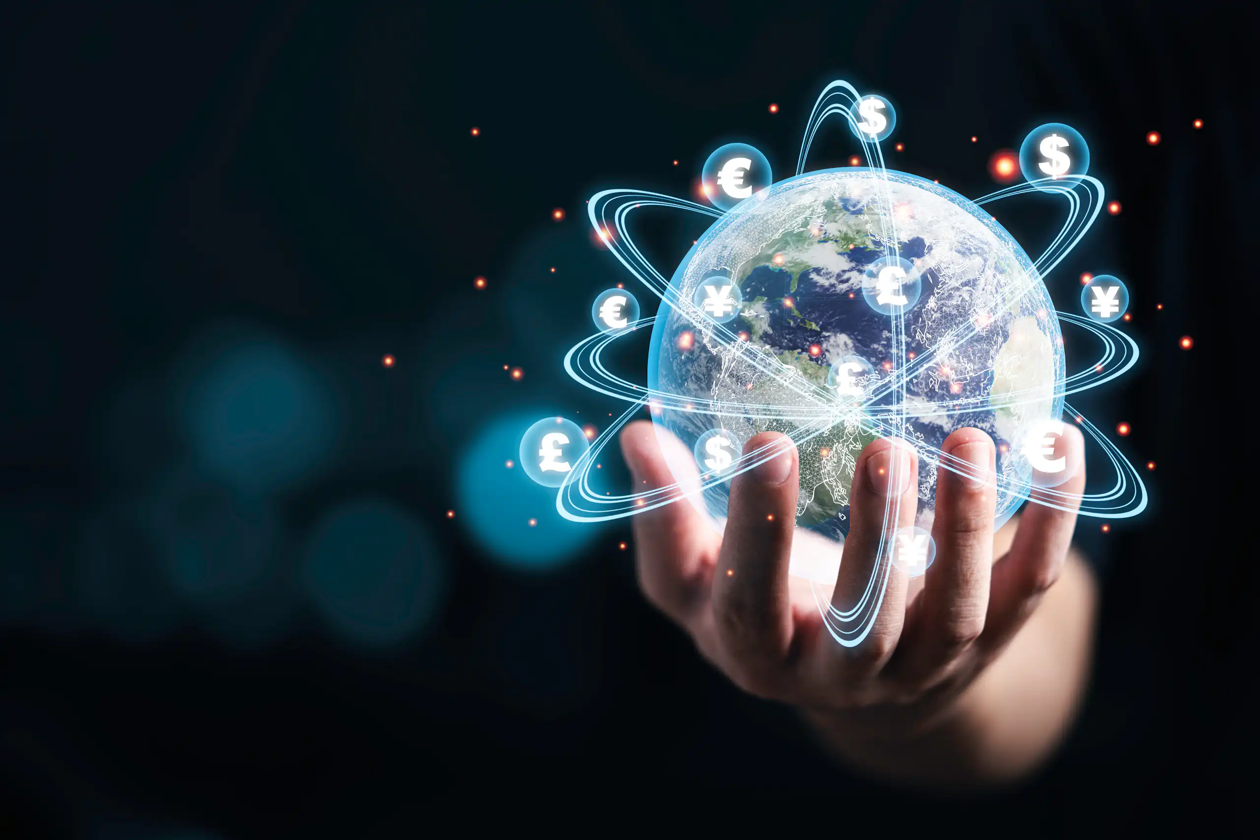 Illustration of a hand holding a globe with multiple currencies