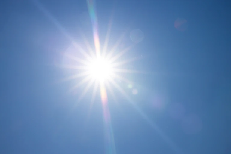 The sun, pictured against a clear sky.