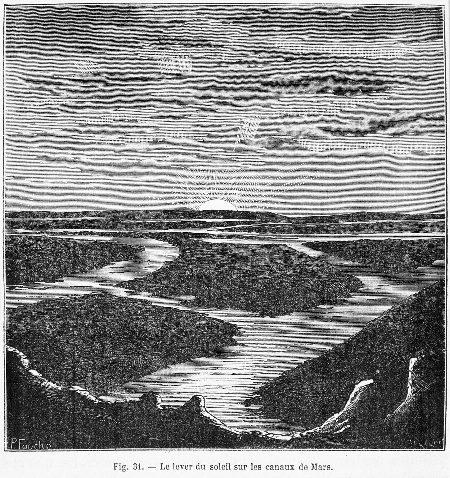A vintage photo of rocky terrain intersected by canals.