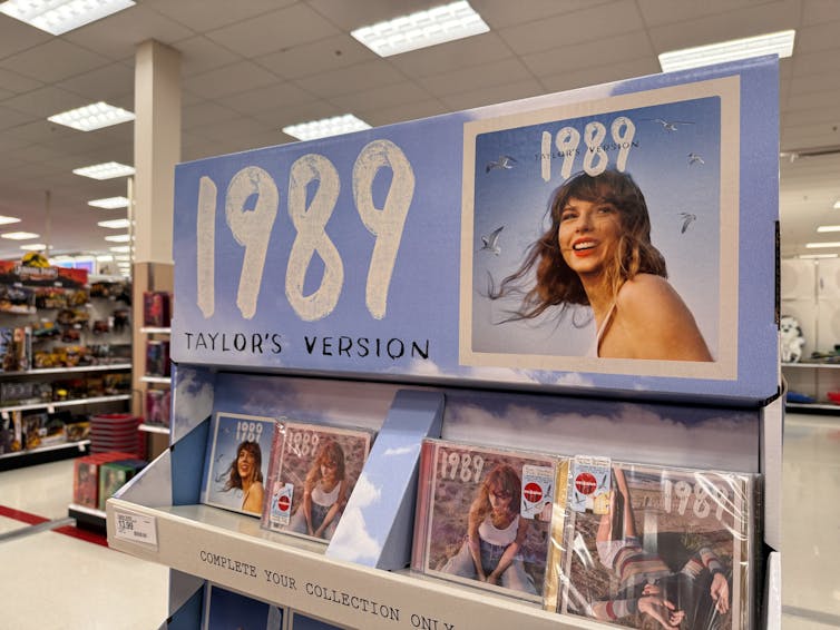 Albums for sale in a shop.