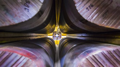 How physicists used antimatter, supercomputers and giant magnets to solve a 20-year-old mystery