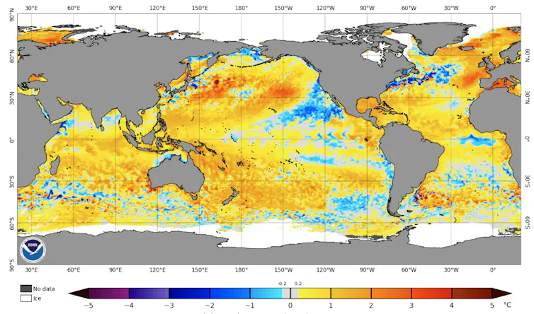A map of the Earth with the ocean in multiple shades of yellow, red, orange and blue.