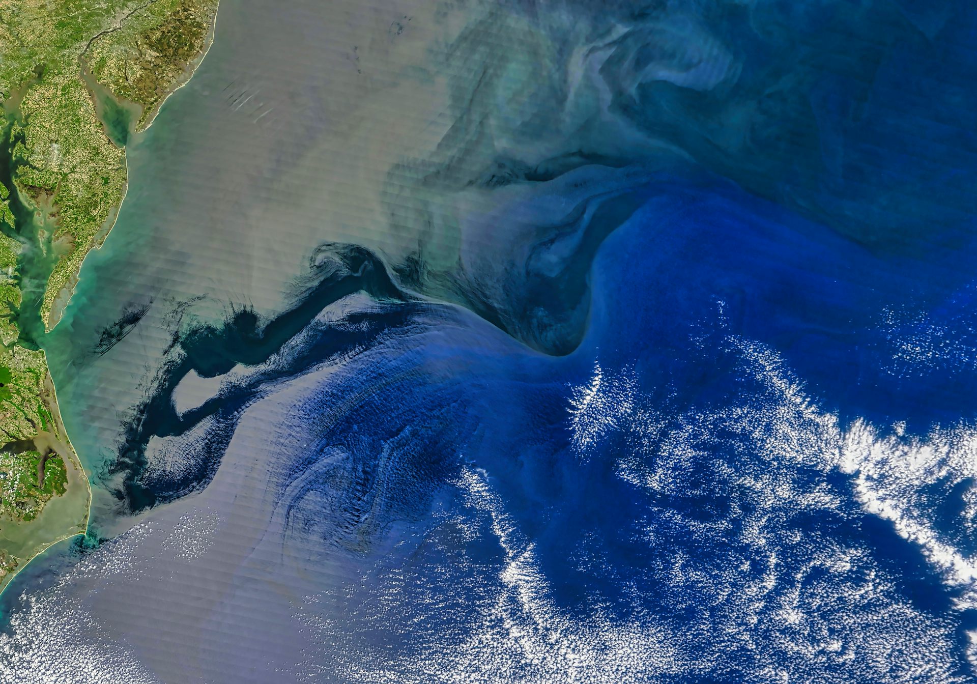 A satellite image of a coastline.