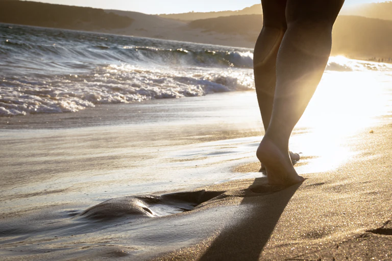 Person walking on the beach