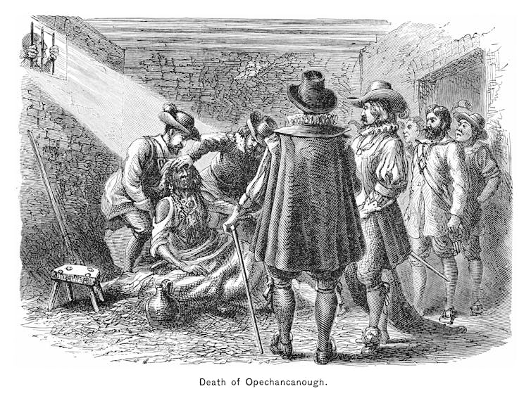 A black and white drawing depicts a Native American man surrounded by colonial soldiers in a cell.