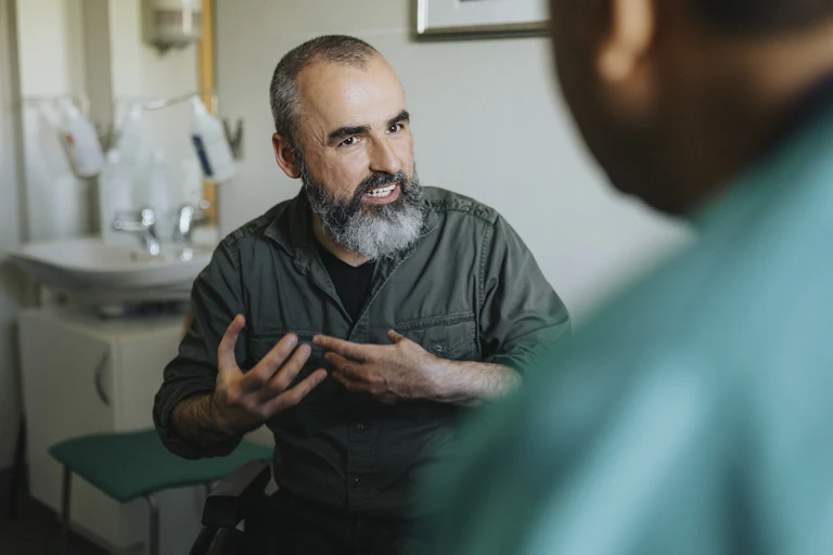 Man talks to his GP