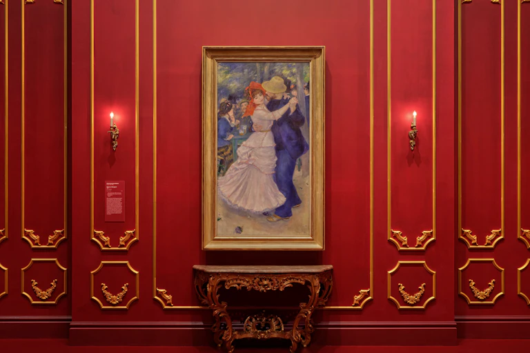 Renoir's Dance at Bougival in a red room.