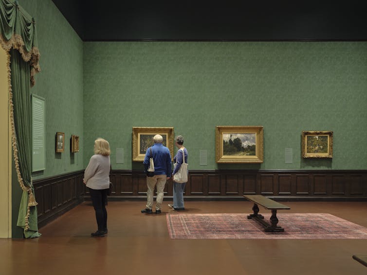 People in a green room