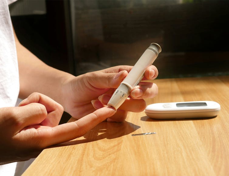 a person tests their blood levels