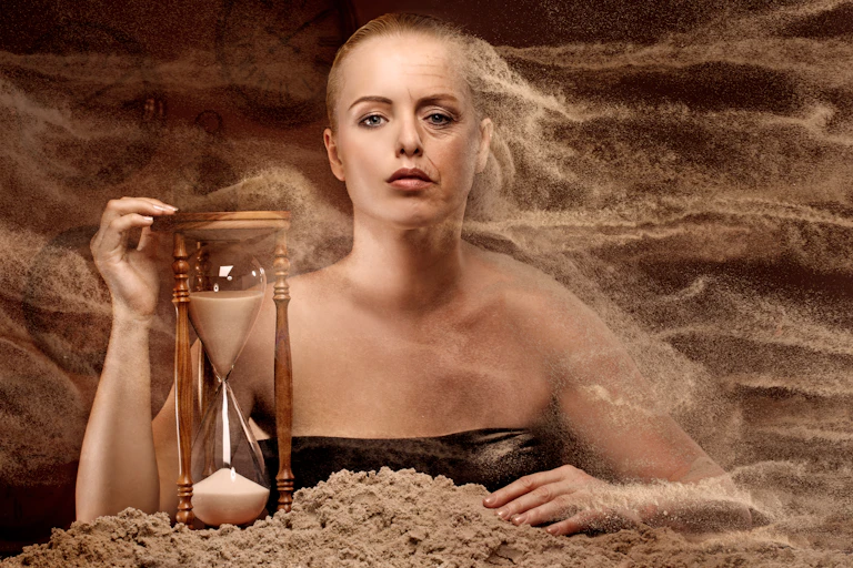Illustration showing aging process, young woman become old