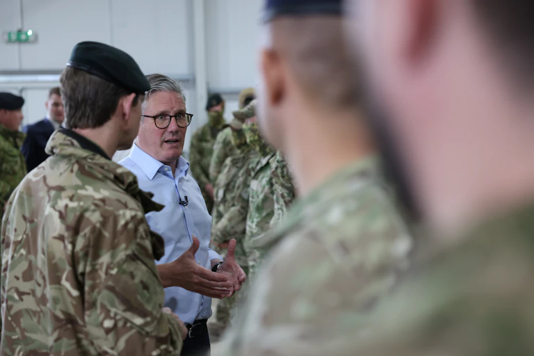 Keir Starmer speaking casually to troops