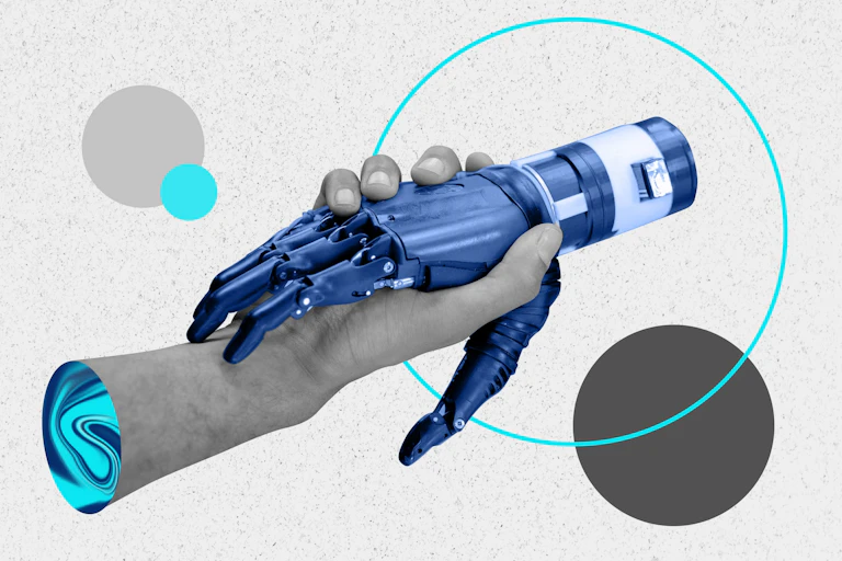 Human hand shaking a robot hand