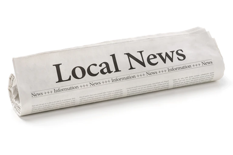 A newspaper is shown rolled up and says 'Local news' in a graphic