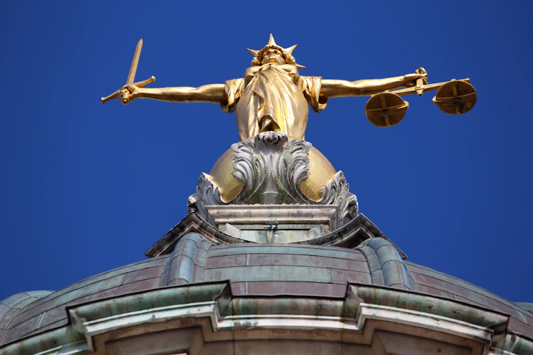View from below of the Justice statue atop the Old Bailey