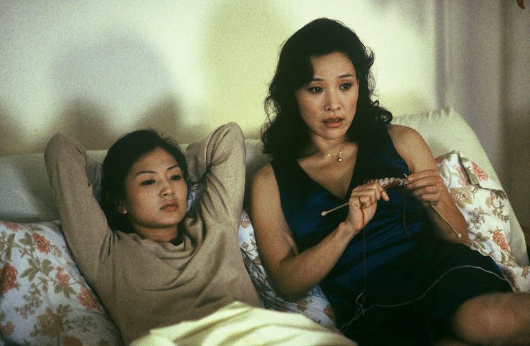 Hidden gemstones of LGBTQ+ cinema: Saving Face is an advanced romcom that tenderly depicts the stories of queer Asians 1 A mother and a daughter lie in bed.