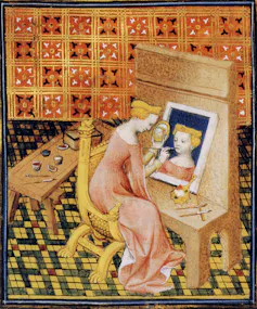Ilustración de una mujer pintando sentada en un pupitre.