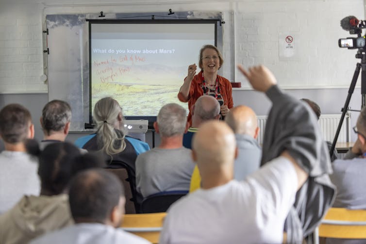 The author giving a talk at an English prison.