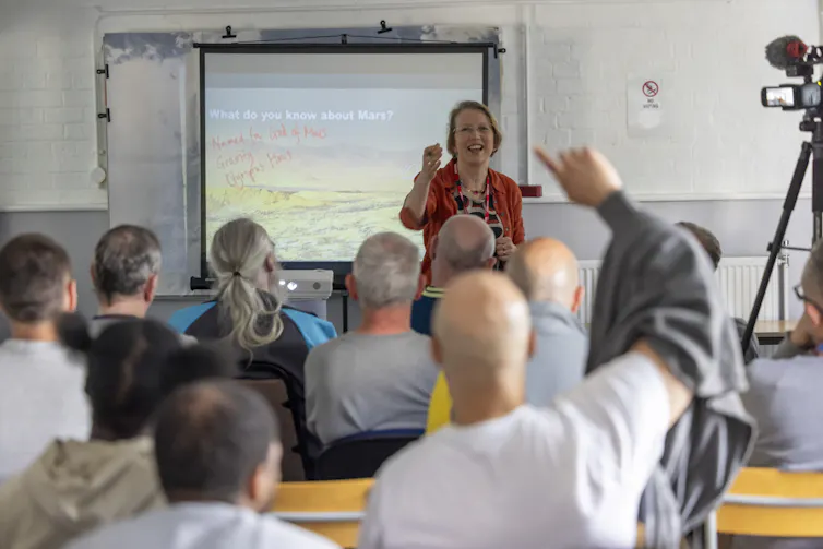The author giving a talk at an English prison.