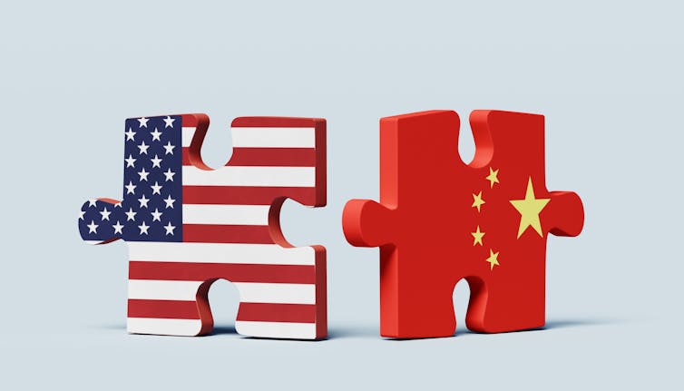 two puzzle pieces — one representing the United States flag and the other the Chinese flag — stand separated against a neutral background