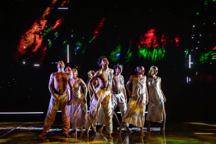 The dancers on stage.